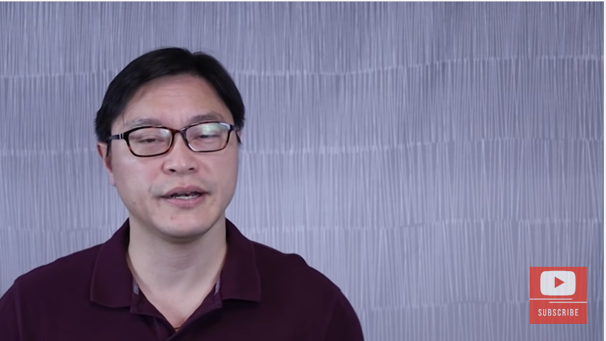 Dr. Jason Fung is pictured against a textured grey background. He is wearing glasses and speaking to the camera by which his recording will be saved and published.